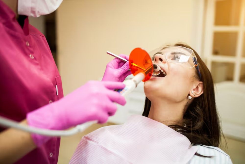 tooth-colored white filling restoring a cavity while maintaining the natural appearance of the tooth