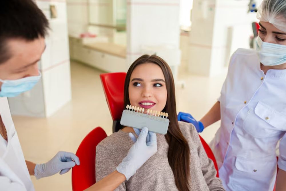 female patient discussing veneers with a dentist